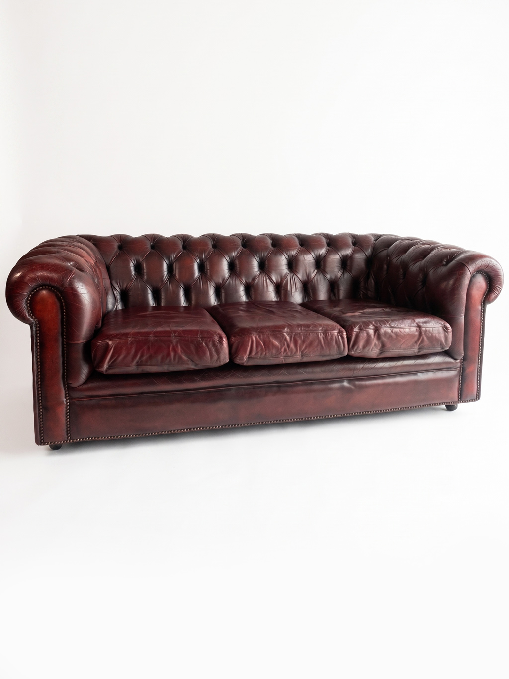 Classic three-seater Chesterfield sofa
