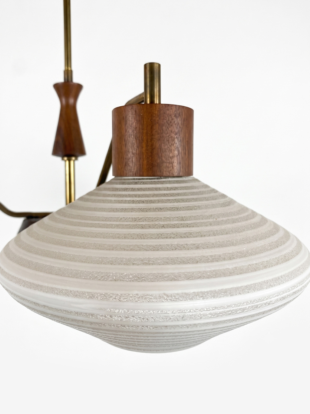 Vintage three-arm chandelier with teak and brass details